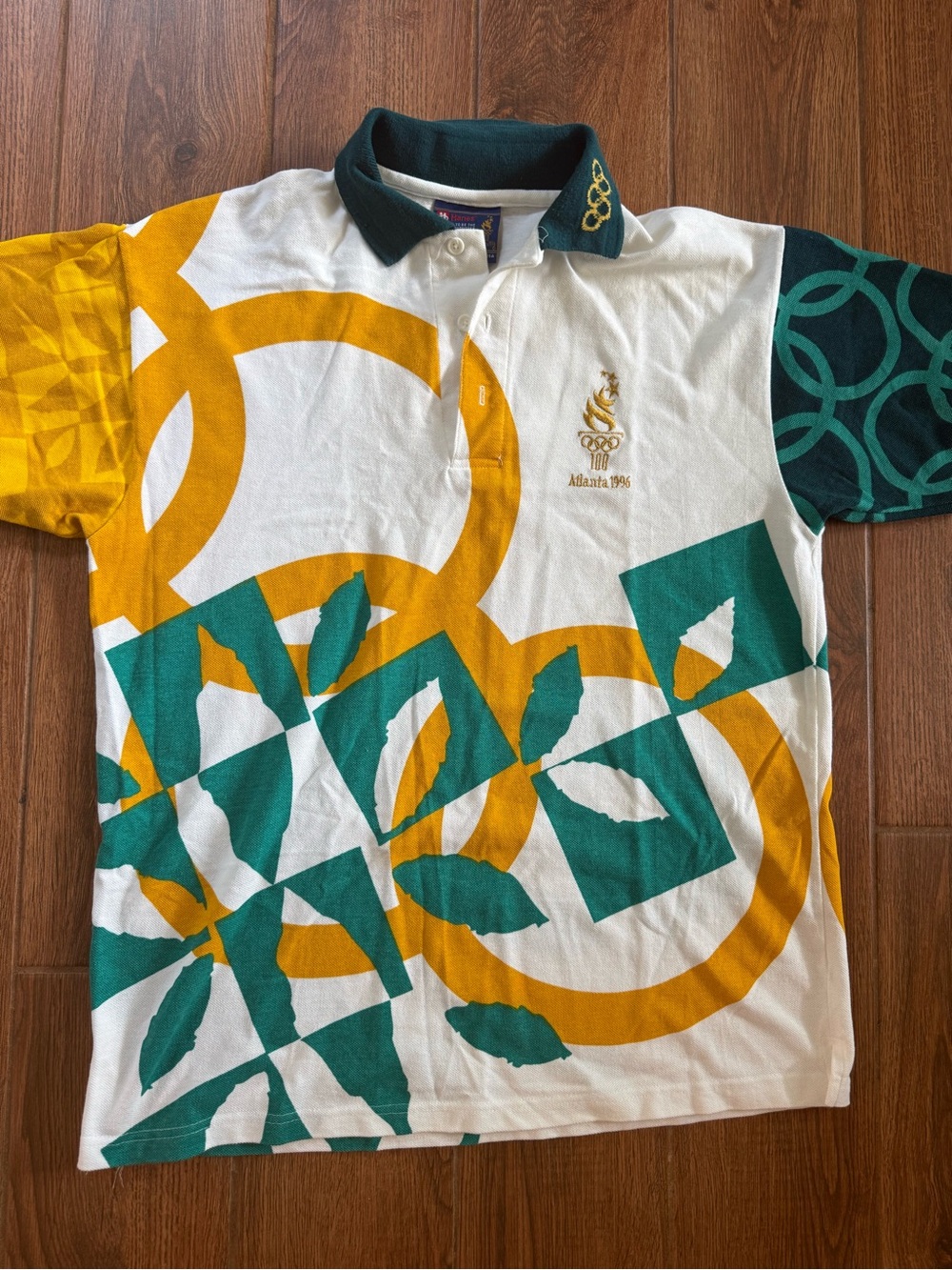 Vintage Atlanta 1996 Olympics Logo Polo in White, Gold & Teal / men’s medium